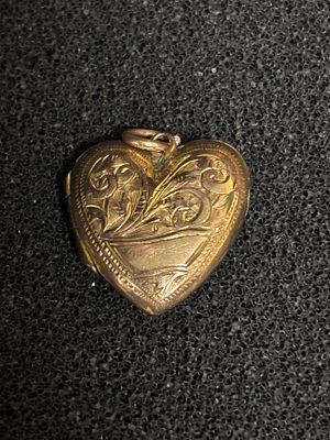 A 9ct gold front and back, heart shaped locket