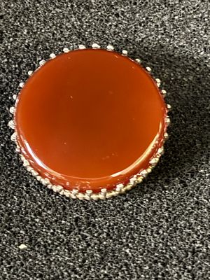 A silver gem set brooch