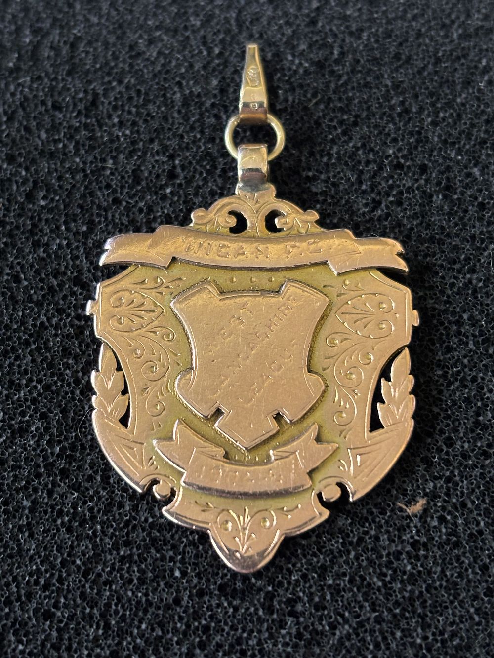 A 9ct Gold football medal presented by the West Lancashire League to J E Blears (forward) of 