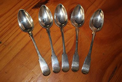 Five HM Silver teaspoons weighing 87.82 gm