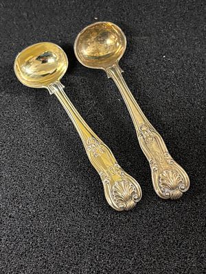 Two HM Silver gilt condiment spoons weighing 54.23 gm