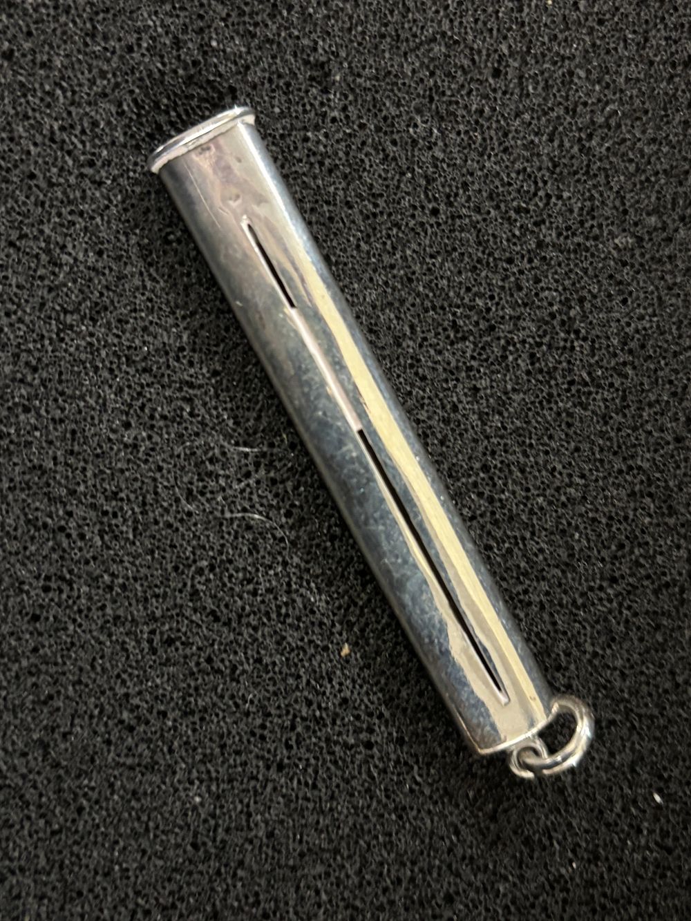 A Samson Mordant HM SIlver pencil cover weighing 8.42 gm