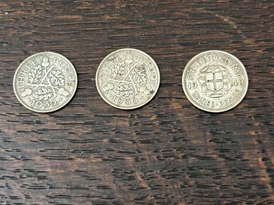Three UK Silver Threepence Coins, 1932, 1936, and 1940. Three UK silver threepence coins 