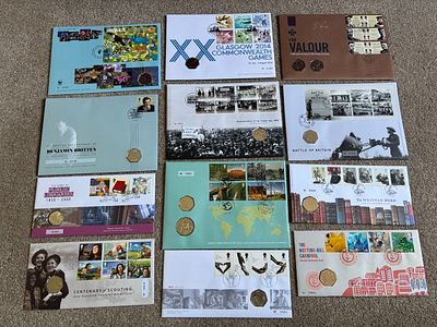 A Collection of UK and Australian Philatelic Numismatic Covers featuring thirteen Commemorative 