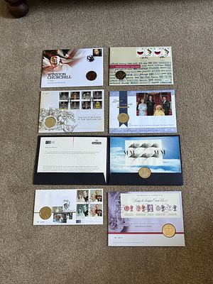 A Collection of UK Philatelic Numismatic Covers and Commemorative Five Pound Coins. A collection 