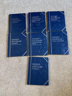 A Collection of UK Pre-Decimal Coin Folders with a large quantity of coins. A collection of blue 