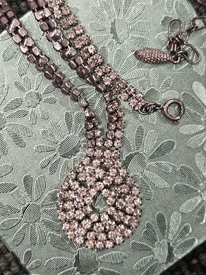 A Two-Strand Gunmetal-Toned Rhinestone Pendant Necklace. A costume jewellery necklace featuring 