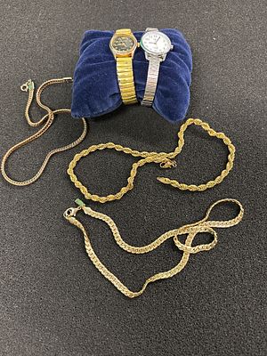 Three yellow metal chains (not tested) together with two ladies wristwatches