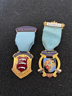 A Pair of Royal Masonic Institution for Boys Steward Jewels Dated 1948 and 1985. This lot 