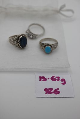 A Trio of Sterling Silver and Stone Set Rings. A group of three sterling silver rings featuring 