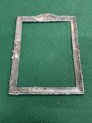 An Edwardian Sterling Silver Picture Frame by Levi & Salaman, Birmingham 1913. An Edwardian 