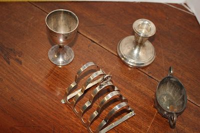 A Collection of Silver and Silver-Plated Tableware Including a Sterling Silver Egg Cup. A 