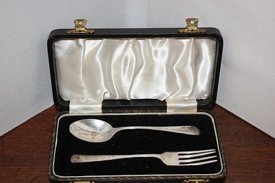 A Cased Silver Child's Fork and Spoon Christening Set. A two-piece silver cutlery set presented 