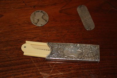 A Trio of Victorian Personal Items Including a Hallmarked Sterling Silver Folding Comb by Levi 