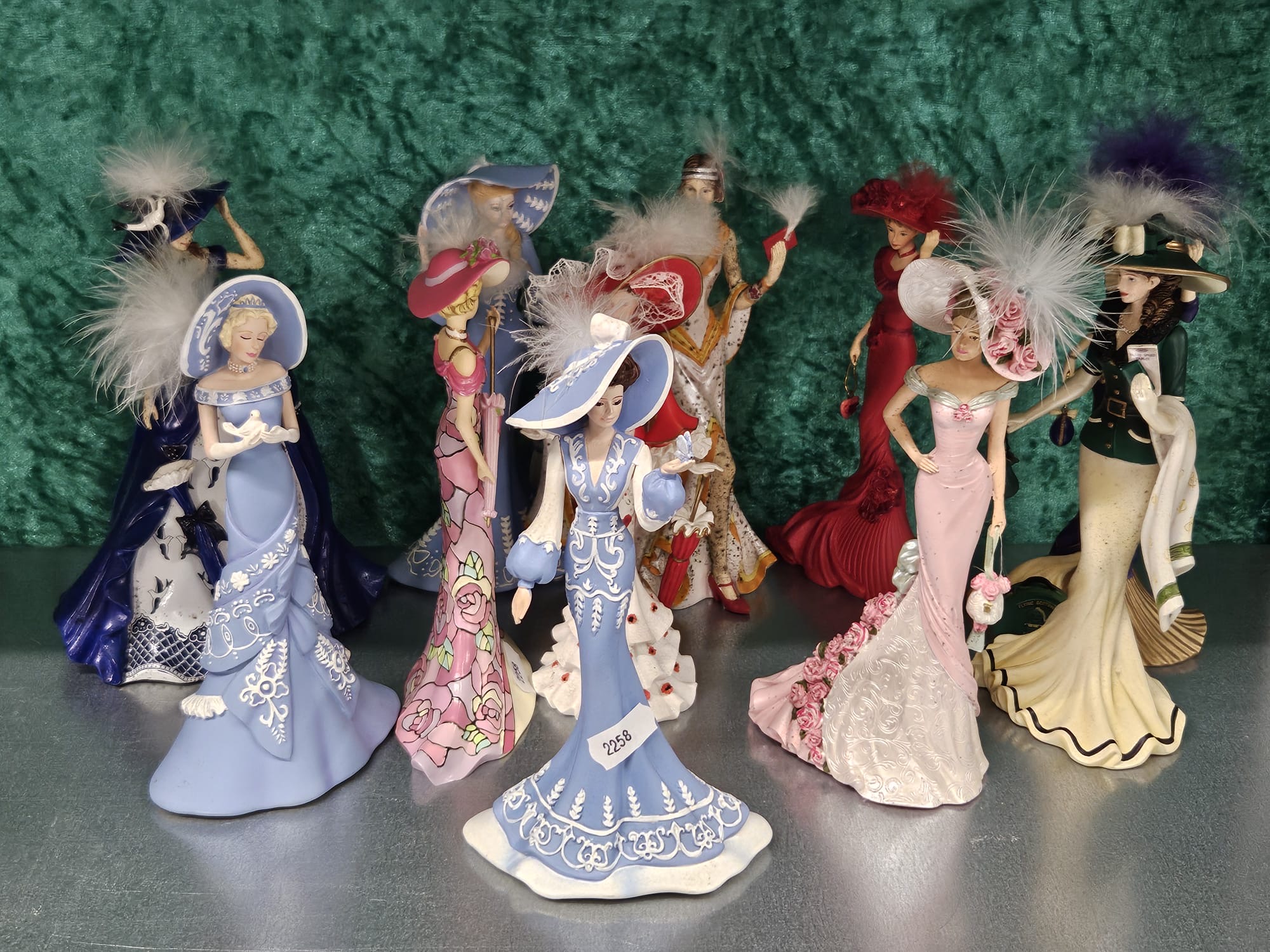 The Hamilton Collection of Painted Ceramic Fashion Figurines with certificates.