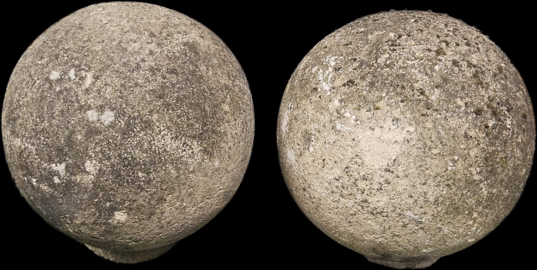 Two concrete garden balls measuring c 22cm diameter