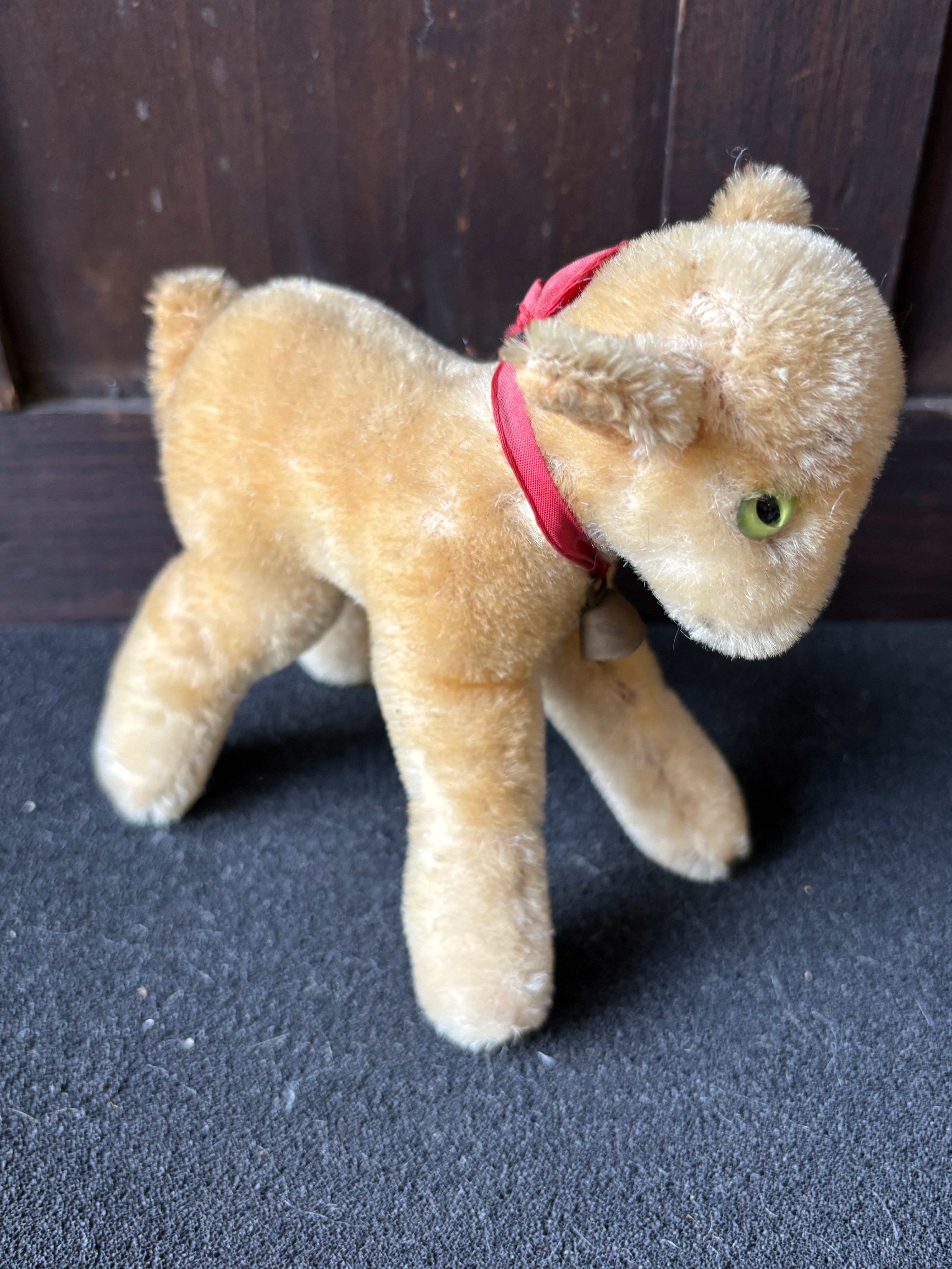 A vintage mohair plush Zicky goat with bell c 14 cm with green eyes (believed to be Steiff)