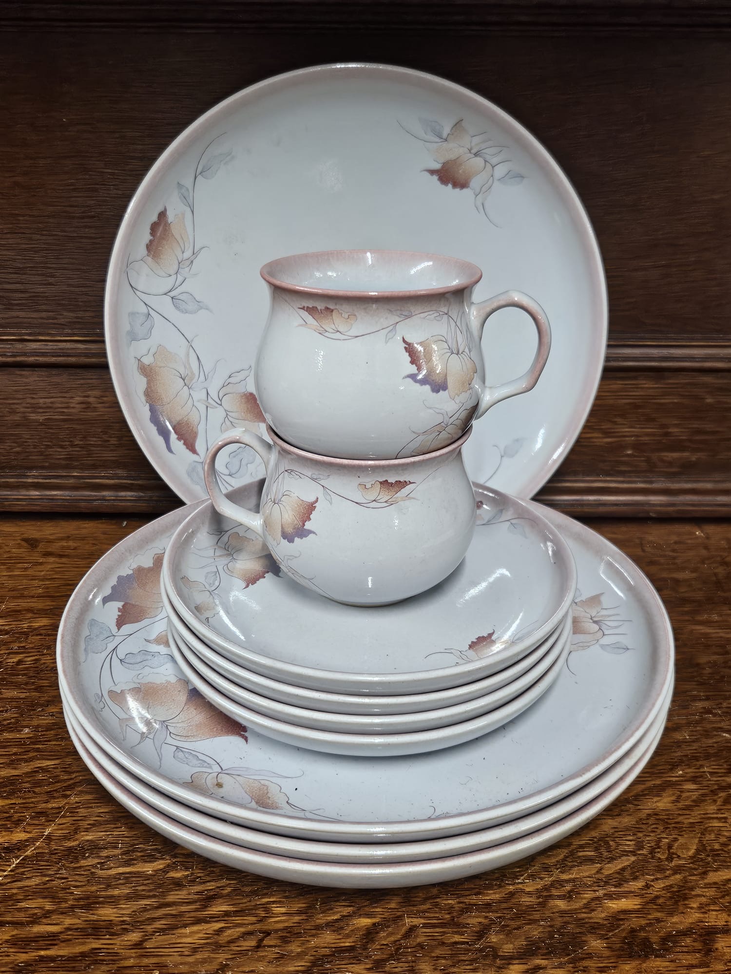 An 11-Piece Stoneware Tea and Dinner Service with Stylised Autumnal Leaf Decoration