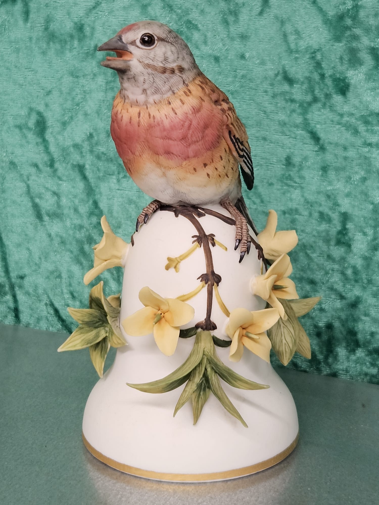 A Franklin Mint Peter Barrett Hand-Painted Porcelain Linnet Bird Bell