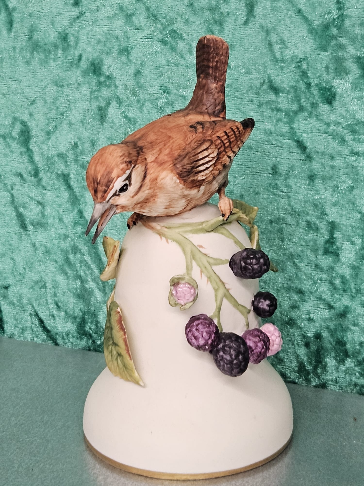A Franklin Porcelain Hand-Painted Bisque Porcelain Bird Bell The Wren by Peter Barrett 1981