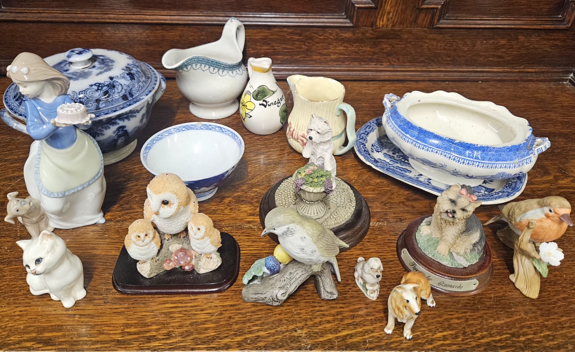 An Assortment of Decorative Tableware and Ceramic Figurines Including Leonardo