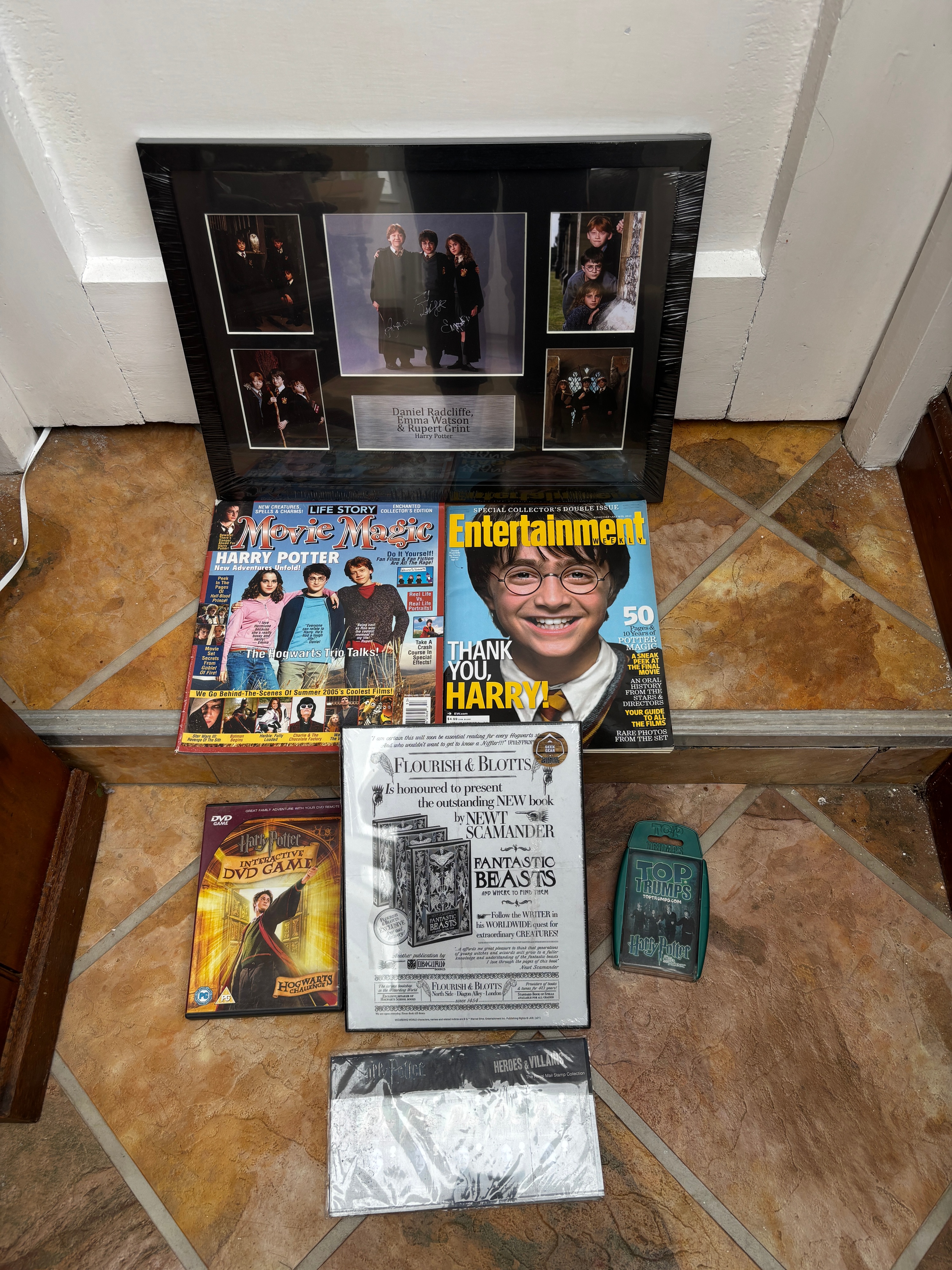 A Collection of Harry Potter Film Franchise Memorabilia including Autographed Framed Display