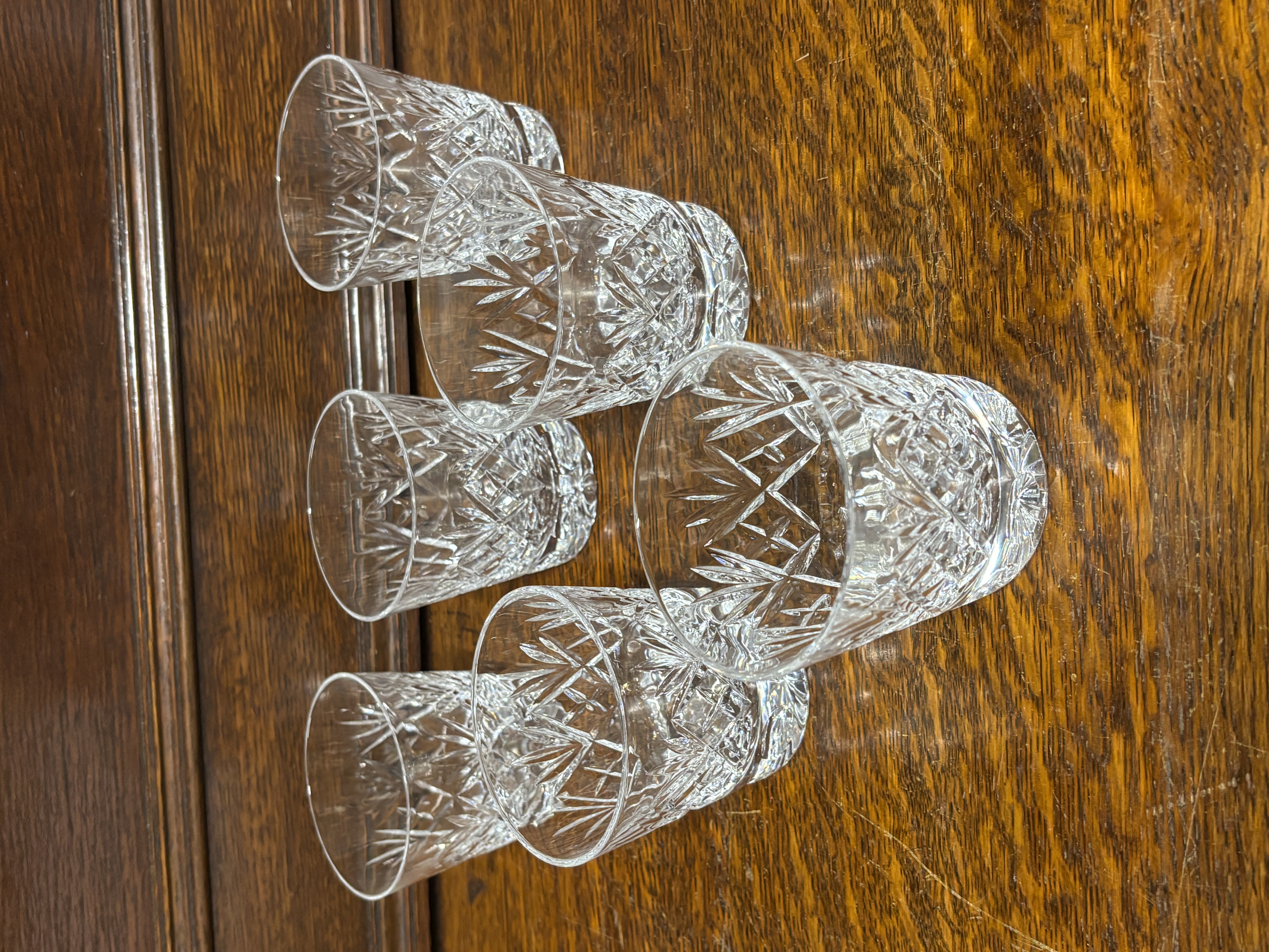 A set of five cut crystal whisky tumblers
