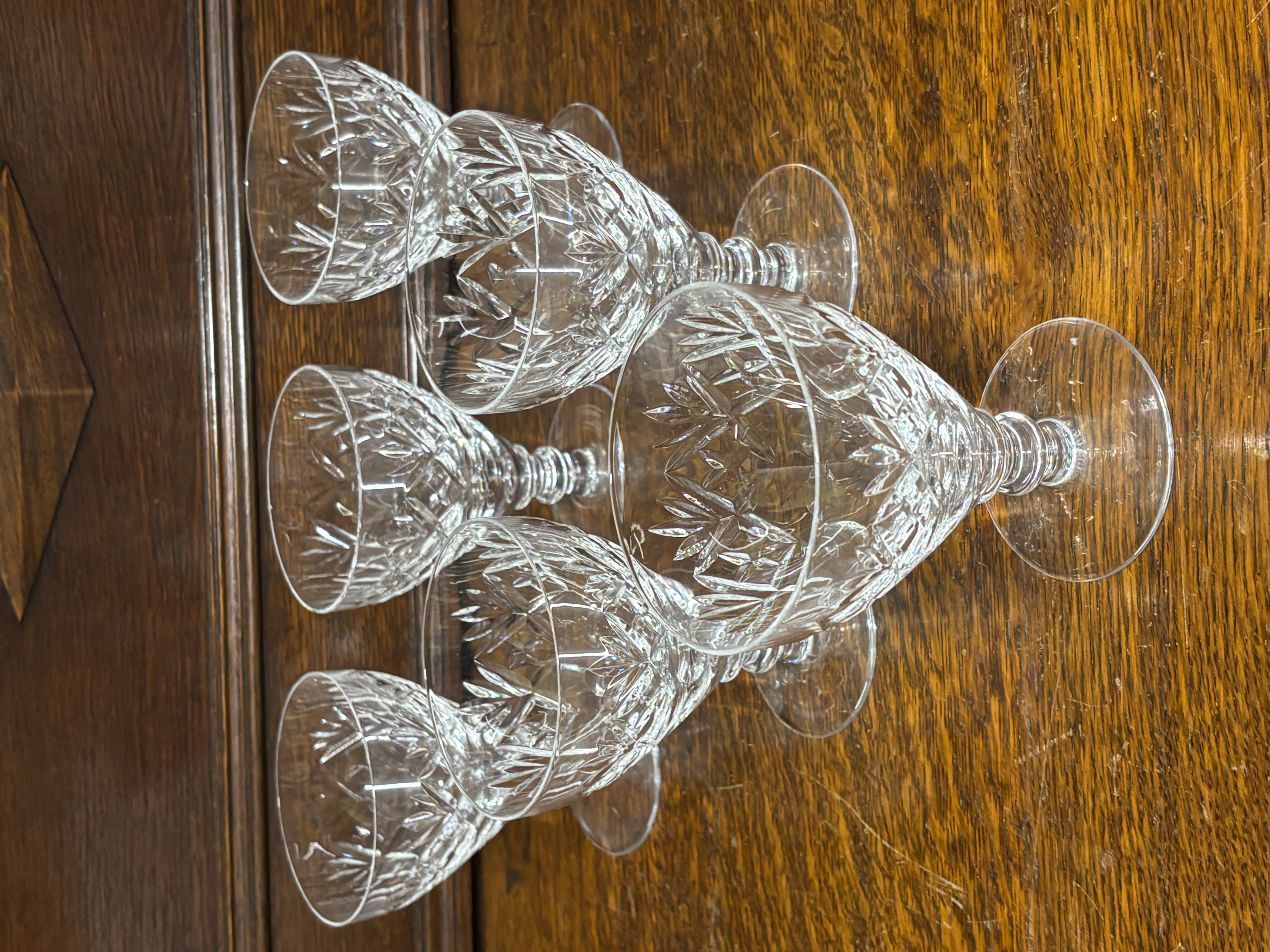 A Set of Six Cut Lead Crystal Stemmed Wine Glasses