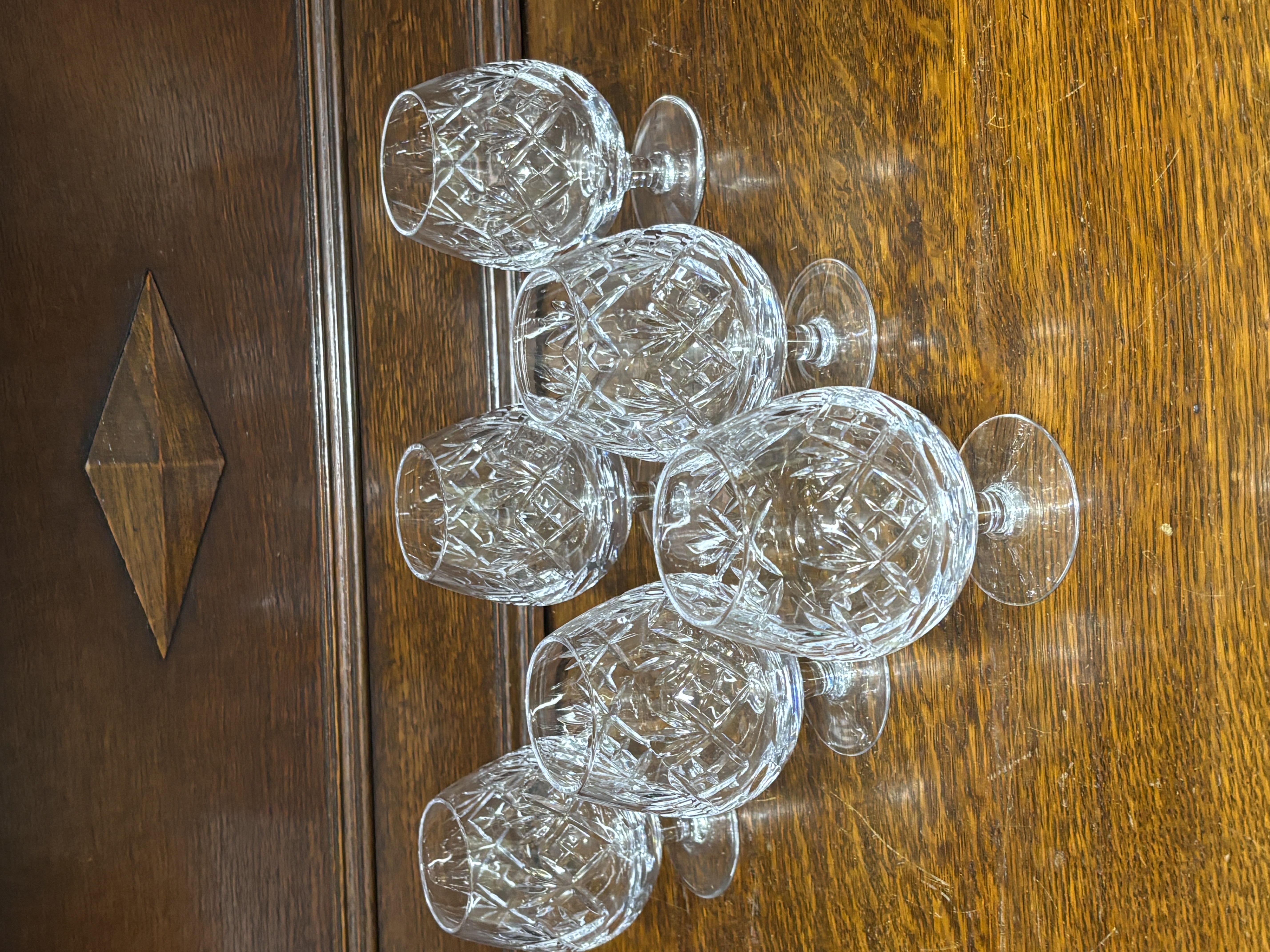 A Set of Six Cut Crystal Brandy Balloons