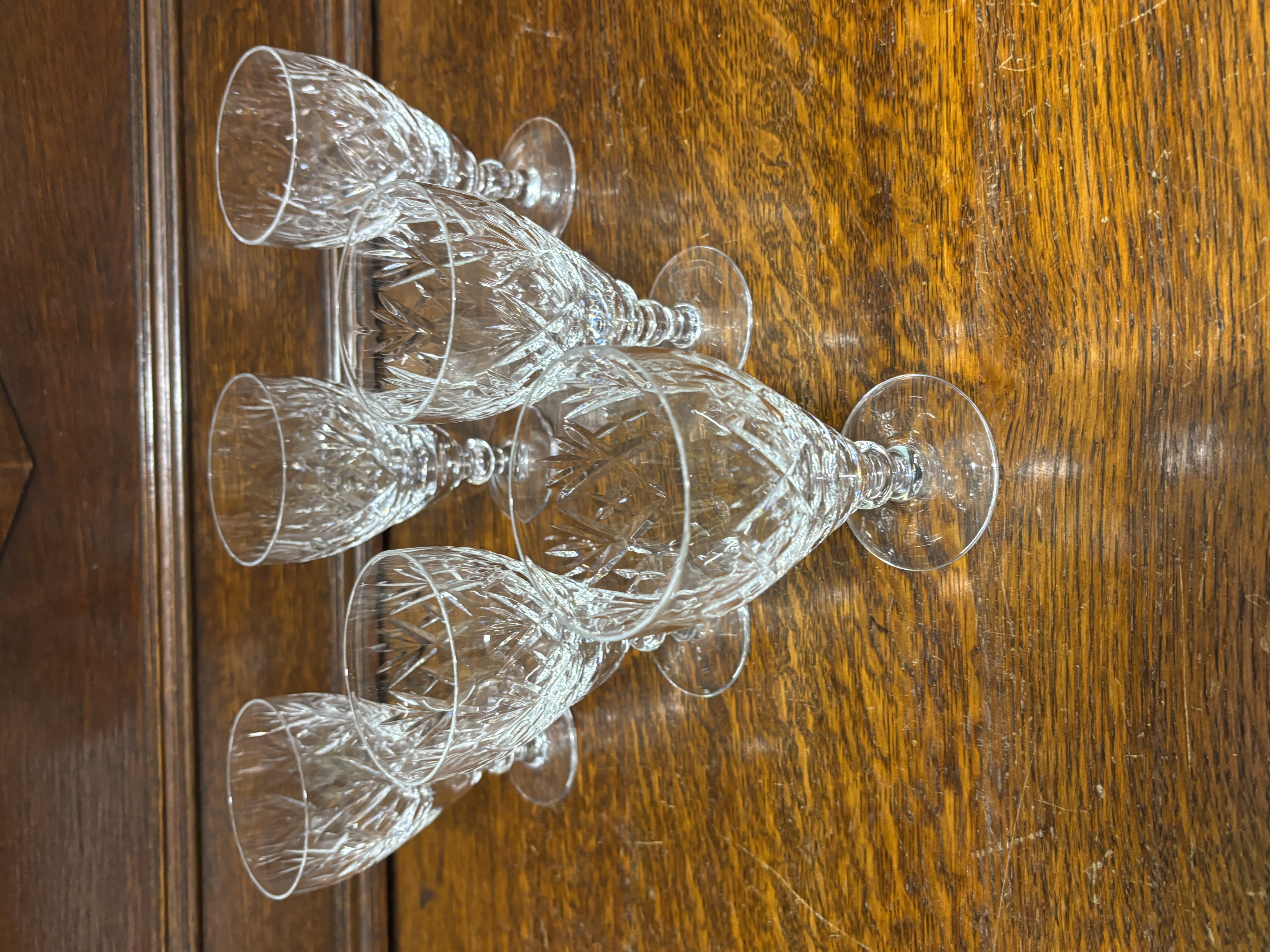 A Set of Cut Lead Crystal Wine Glasses in the Lismore Pattern