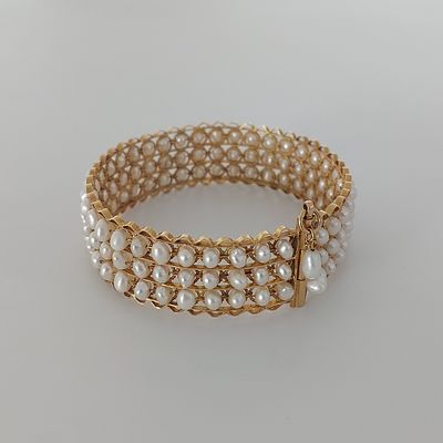 צמיד זהב גוון צהוב 14 קראט, משקל 33.3 גרם, קוטר 6.5 ס"מ, רוחב 2 ס"מ, צמיד לולו מצב חדש.