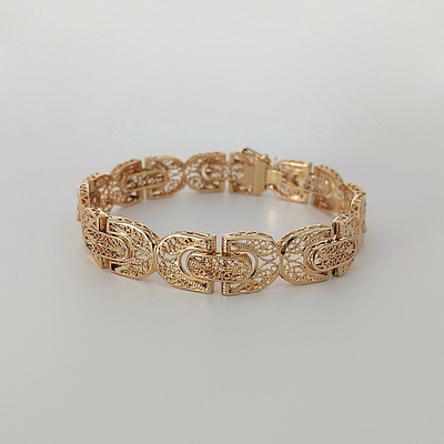 צמיד זהב צהוב 14 קראט חתום, משקל 21.40 גרם, עבודת פיליגרן שנות השישים, אורך 20 ס"מ, רוחב 1.9 