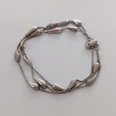 צמיד זהב לבן 18 קראט 750, עבודת יד ישנה של ה.שטרן HStern, משקל 16.35 גרם, אורך כולל 18 ס"מ 