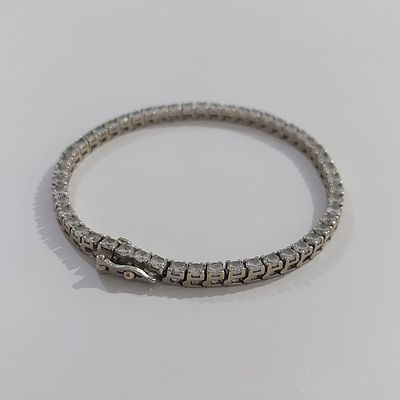 צמיד טניס זהב לבן 14 קראט חתום משובץ בזירקונים, משקל 12 גרם, אורך 19 ס"מ, רוחב 3 מ"מ. חדש.