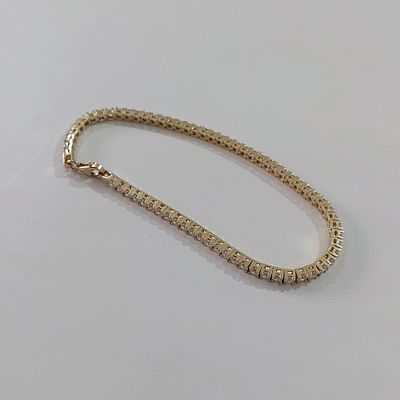 צמיד טניס זהב צהוב 14 קראט חתום, משובץ בזירקונים, משקל 8.2 גרם, אורך 18.5 ס"מ, רוחב 2.5 מ"מ. חדש.