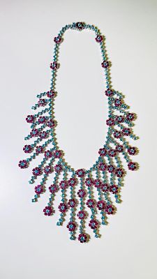 ענק מרהיב זהב 18k משובץ אבני טורמלין וטופז טבעיות במשקל כולל של כ 55ct. משקל כ 136.26 גרם