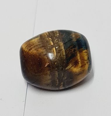 אבן טייגר איי (עין הנמר) גדולה ומרהיבה . כ 77.90ct