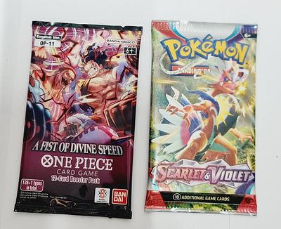 פוקימון וואן פיס- זוג חבילות קלפים סגורות 1 פוקימון 1 וואן פיס