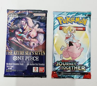 פוקימון וואן פיס- זוג חבילות קלפים סגורות 1 פוקימון 1 וואן פיס