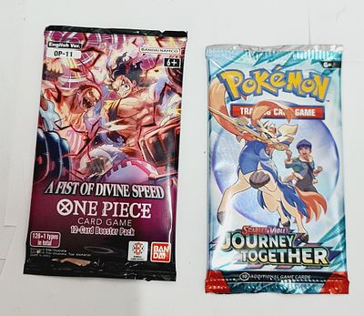 פוקימון וואן פיס- זוג חבילות קלפים סגורות 1 פוקימון 1 וואן פיס