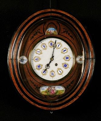 Anonymous c. 1900 - Wall clock "Ojo de Buey" (Bull's Eye). Wood, glass, steel, iron, marble and
