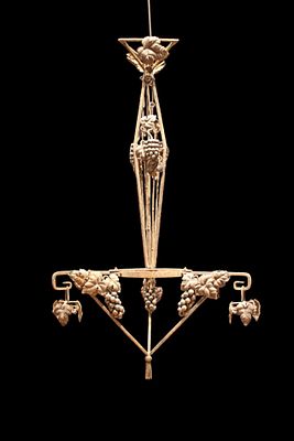 Iron chandelier, 3 lights, 20th century. Manual wrought iron work with motifs of bunches of 