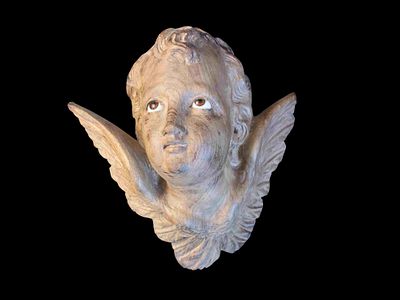 Anonymous Spanish ca. 1950 - Cherubic head. Sculpture representing a cherub's head carved in oak 