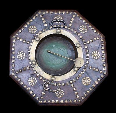 18th century Spanish brazier. An 18th century Spanish brazier made of walnut wood, with a gilded 