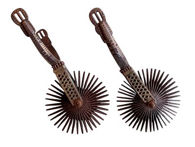 Pair of silver-plated spurs, c. 1930s. Pair of 19th century spurs made of steel, iron and 