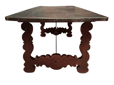 19th century Spanish table. Spanish table in solid wood with two legs and iron fasteners. 