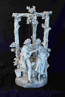 Anonymous 20th century - Porcelain centre. Representation of a gallant scene in which two lovers 