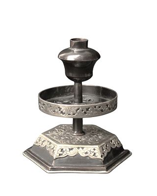 Oriental Candlestick, ca. 1900. Signed. A candlestick of a unique type consisting of a narrow 