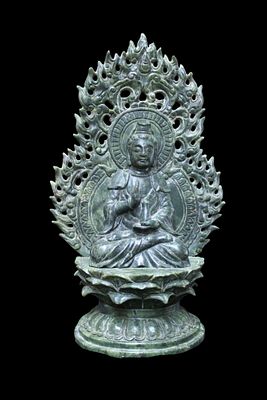 Idol Figure, Oriental Art 19th-20th centuries. Jade stone sculpture representing an oriental 