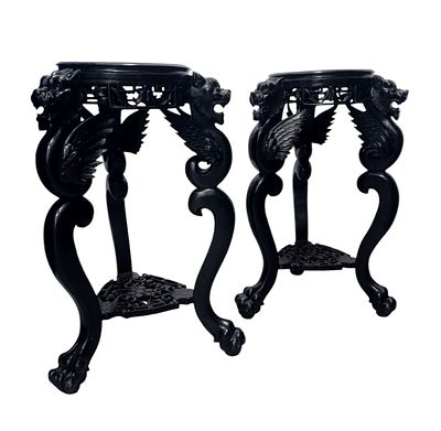 Pair of oriental pedestals c. 1900. Pair of oriental carved and ebonised wood bases, circa 1900. 